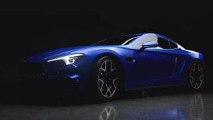 Blue sports car with paint protection film in a dark studio